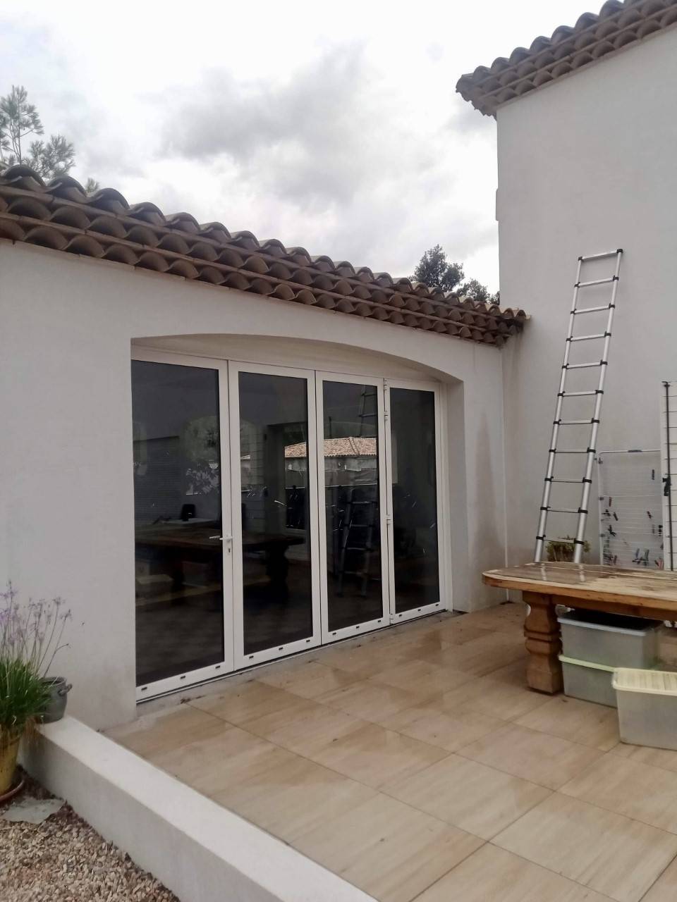 installation porte repliable